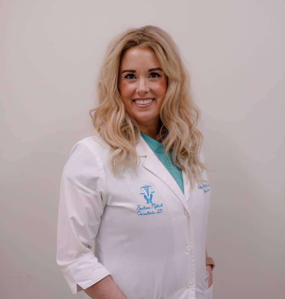 Smiling medical professional in white coat