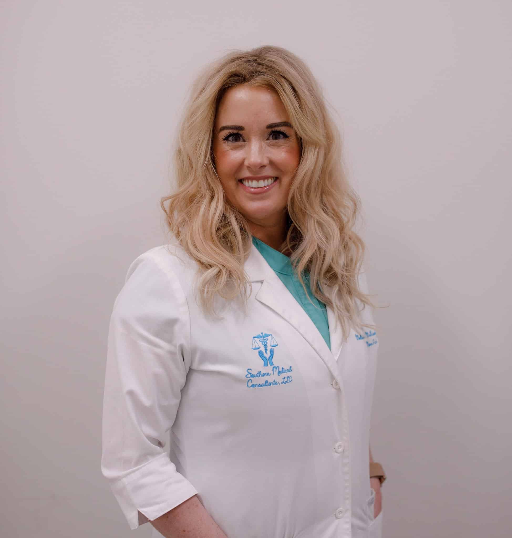 Smiling medical professional in white coat